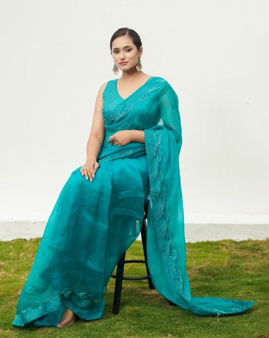 Sawan
Turquoise saree