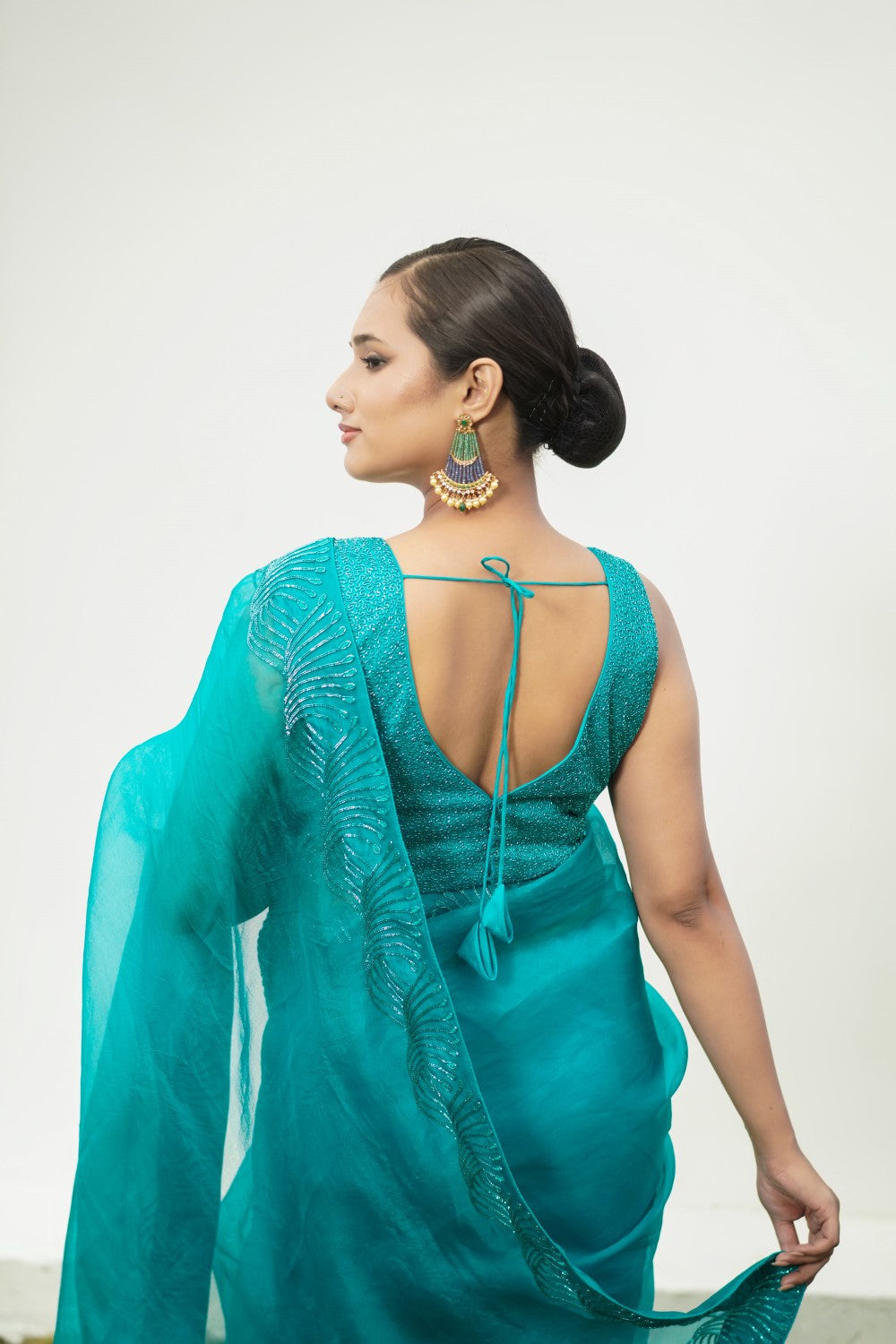 Sawan
Turquoise saree