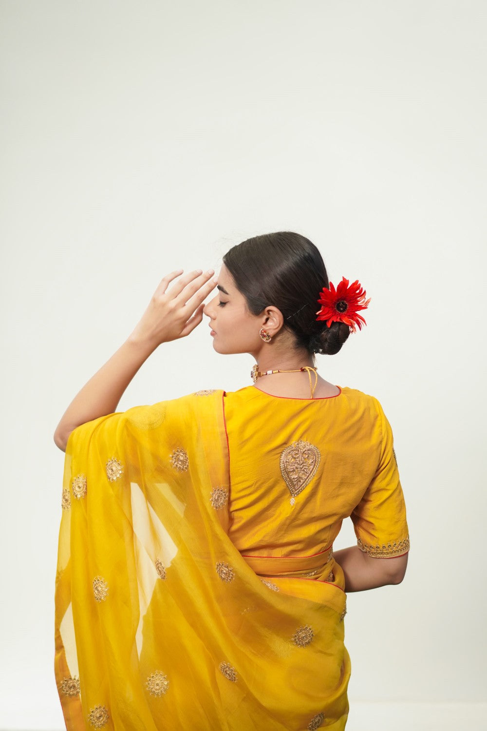 Sajda 
yellow saree