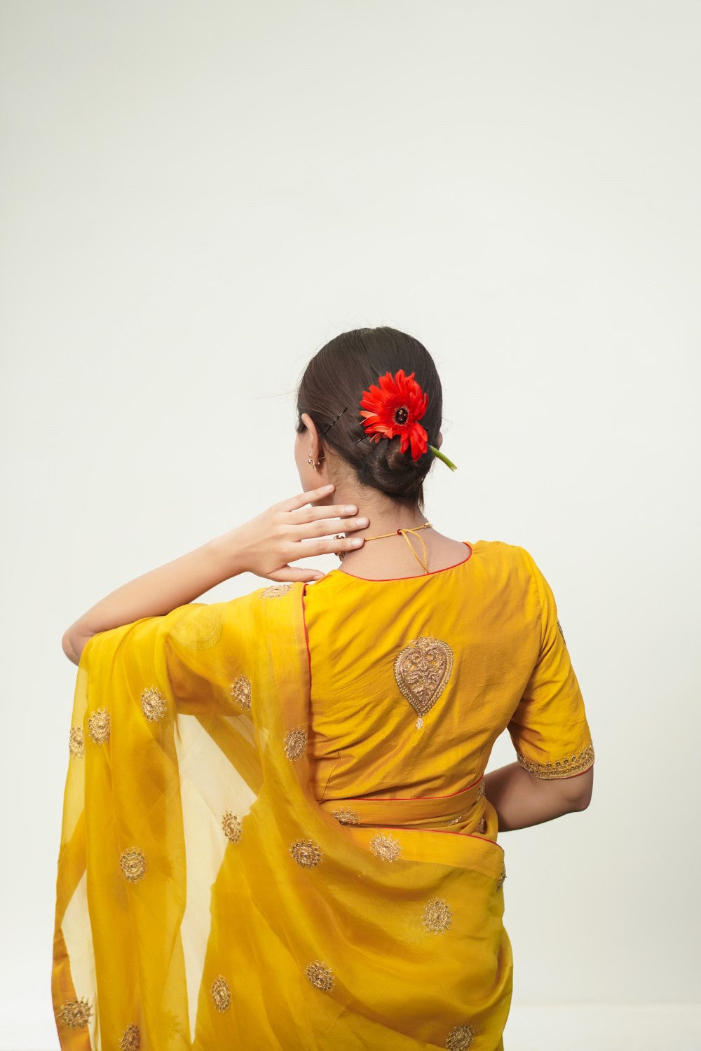 Sajda 
yellow saree