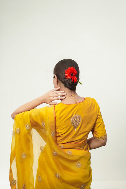 Sajda 
yellow saree